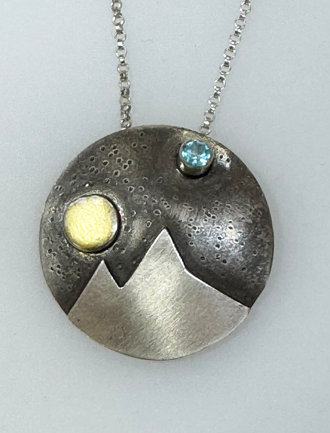 Colorado Sky Blue Topaz with Gold Moon (1